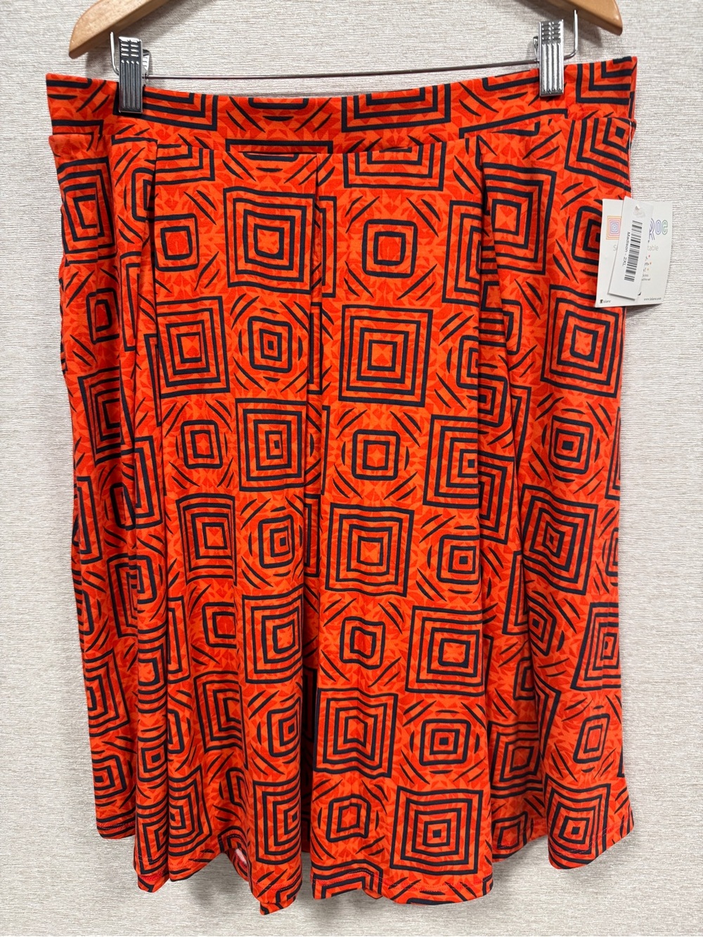LuLaRoe Orange and Navy Geometric A-Line Skirt (Madison) - with pockets